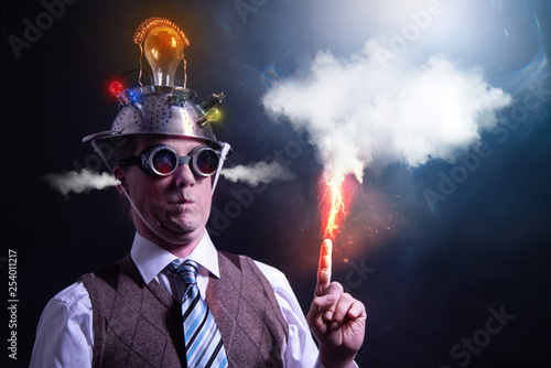 distraught looking conspiracy believer in suit with aluminum foil head with chemtrails cloud chemtrail
