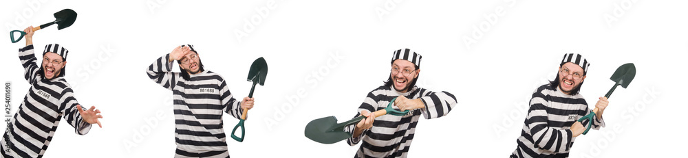 Prison inmate with spade isolated on white Prison inmate with spade isolated on white