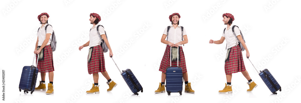 Man in scottish skirt with suitcase isolated on white Man in scottish skirt with suitcase isolated on white