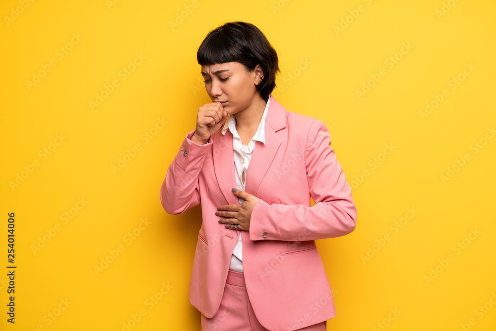 Modern woman with pink business suit is suffering with cough and feeling bad Modern woman with pink business suit is suffering with cough and feeling bad
