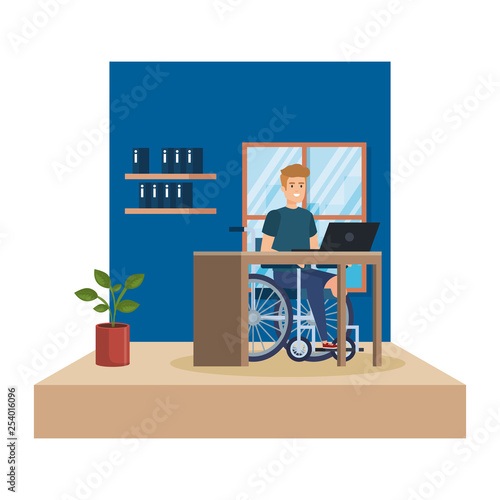 young man in wheelchair working in the office