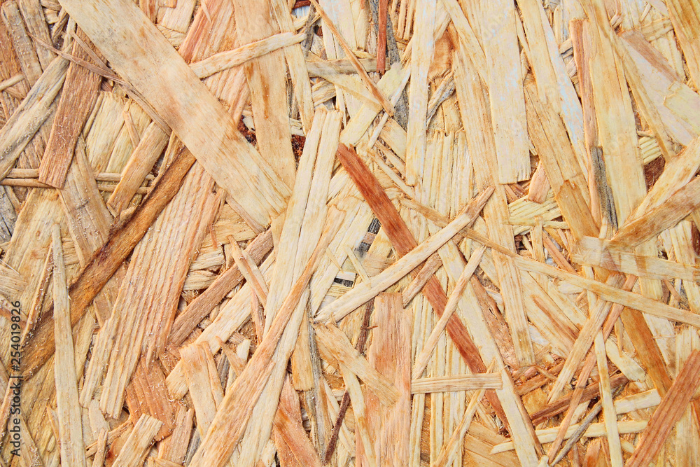 Oriented strand board. Wood sheet plywood. Close-up. Background. Texture. Oriented strand board. Wood sheet plywood. Close-up. Background. Texture.