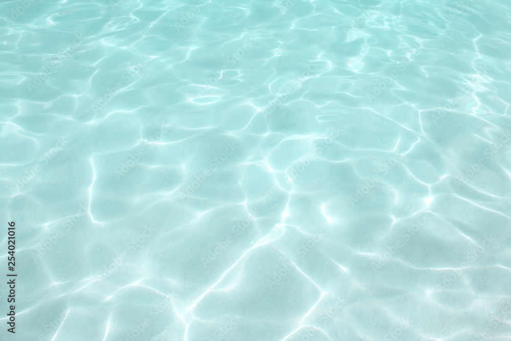 Bluish sea. Clear and clean water. Background. Texture.