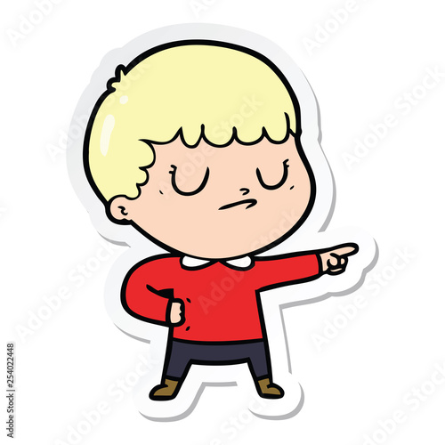 sticker of a cartoon grumpy boy