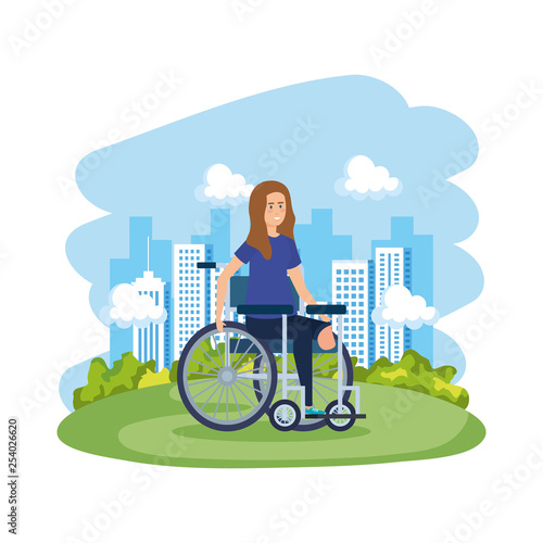 young woman in wheelchair in the park