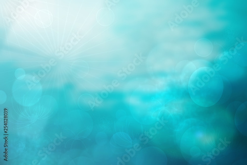 Abstract bright spring or summer landscape texture with blue bokeh lights and blue bright sunny sky. Autumn or summer background with copy space.