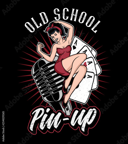 Pin up girl on the microphone. photo