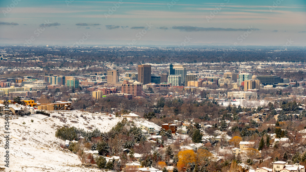 Winter on the city of Boise skyline with distant clouds on the horizon