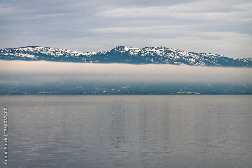 Fototapeta premium Cloud around a Norwegian Mountain