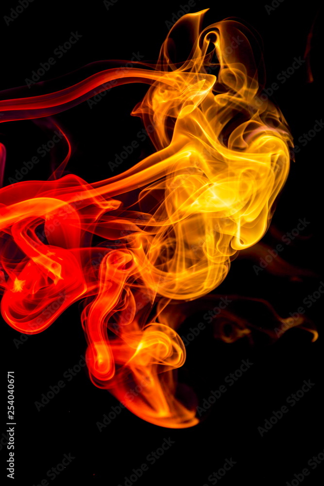 Colored smoke on black background Colored smoke on black background