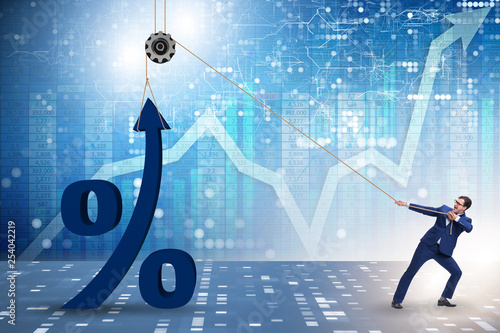 Foto Businessman increasing interest rate in market