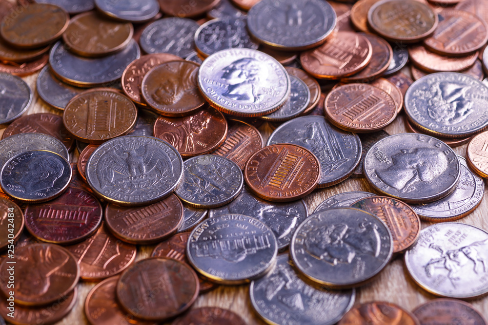 Pile of Golden coin, silver coin, copper coin, quarters, nickels, dimes, pennies, fifty cent piece and dollar coins. Various USA coins, American coins for business, money, financial coins and economy Pile of Golden coin, silver coin, copper coin, quarters, nickels, dimes, pennies, fifty cent piece and dollar coins. Various USA coins, American coins for business, money, financial coins and economy