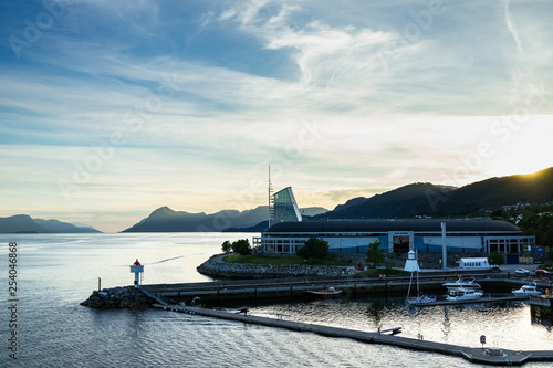 Sunset in Molde with two landmarks: Satdium and modern hotel, Norway photo