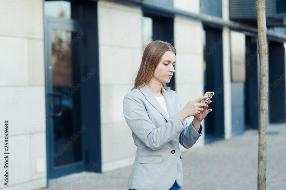 Young woman wearing casual using smartphone outdoor Young woman wearing casual using smartphone outdoor