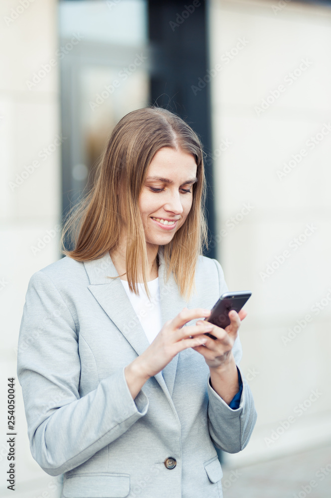 Young woman wearing casual using smartphone outdoor Young woman wearing casual using smartphone outdoor