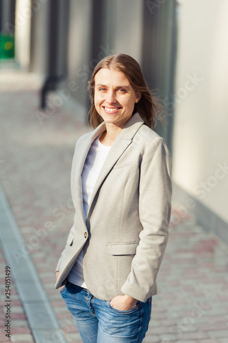 Portrait of beautiful smiling blonde young woman 