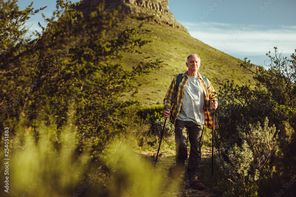 © Jacob Lund - Senior man on an adventurous trek © Jacob Lund - Senior man on an adventurous trek