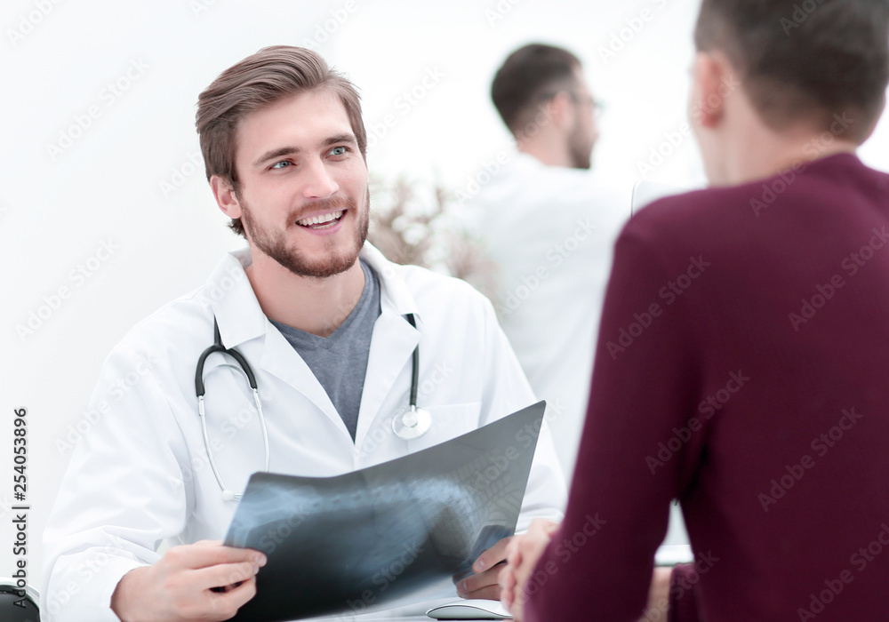 doctors discuss with the patient the x-ray doctors discuss with the patient the x-ray