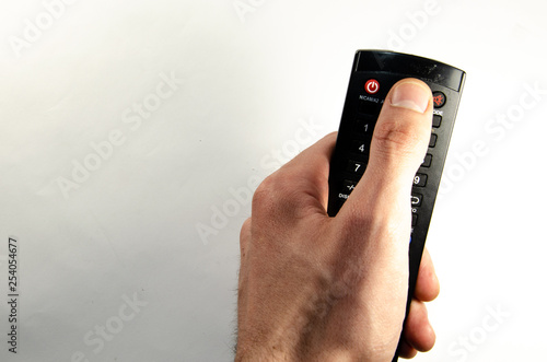 Wallpaper Mural Remote control from the equipment in the hands Torontodigital.ca