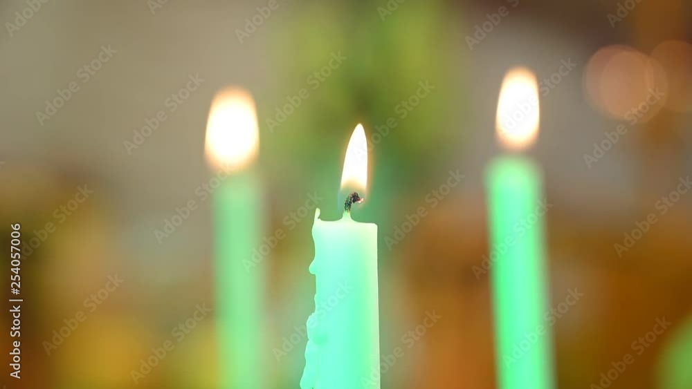 three candles on black background three candles on black background