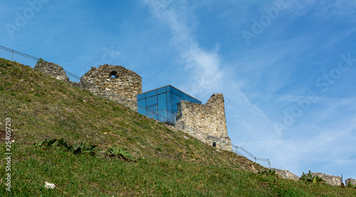 you are seeing parts of the Burg Griffen in Austrian, it is an old medieval castle, a part was rebuild with modern blue cube made of glass, photo