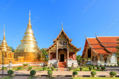 Chapel and golden pagoda at Wat Phra Singh Woramahawihan in Chiang Mai, North of Thailand © wirojsid