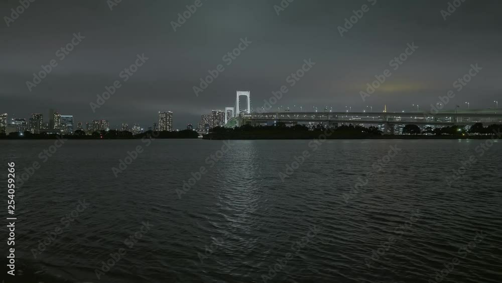 Rainbow Bridge and Skyline of Tokyo by night - beautiful view from Odaiba Rainbow Bridge and Skyline of Tokyo by night - beautiful view from Odaiba