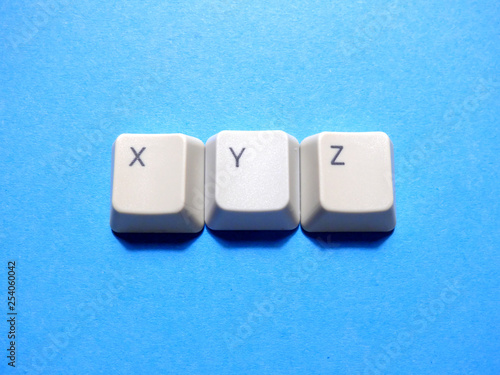 Computer keyboard buttons with XYZ letters on it. The concept of cartesian coordinate system. photo