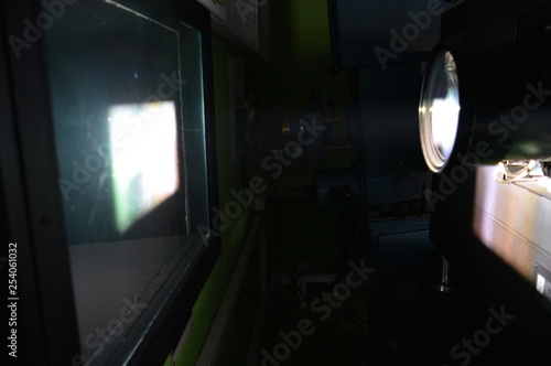 DCP movie projector screening in a cinema, projection booth, close-up