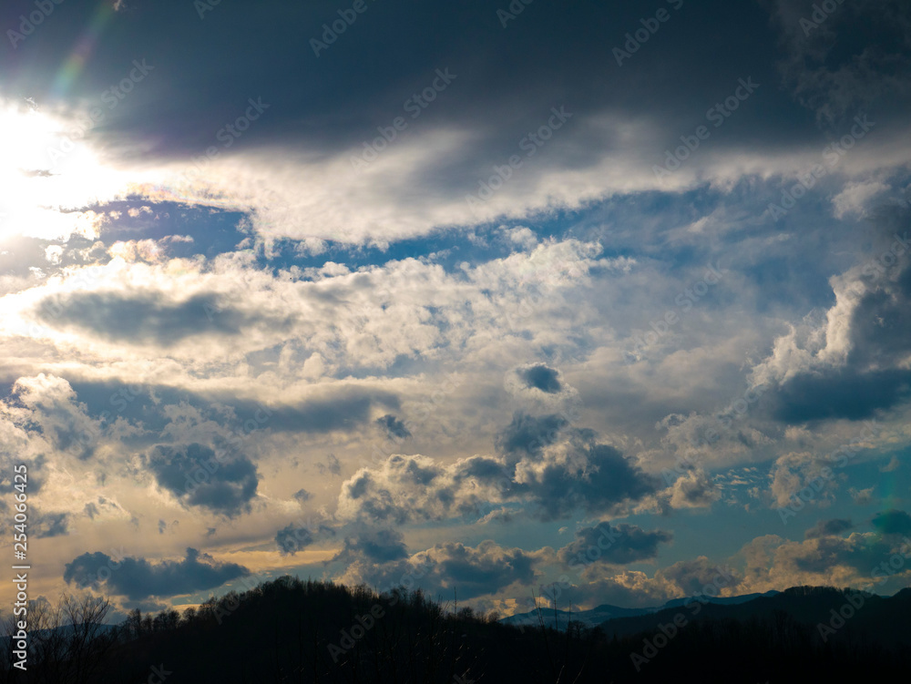 Beautiful landscape in the mountains at sunset. View of colorful sky with amazing clouds. Beautiful landscape in the mountains at sunset. View of colorful sky with amazing clouds.
