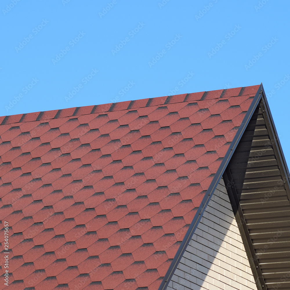 Decorative metal tile on a roof Decorative metal tile on a roof