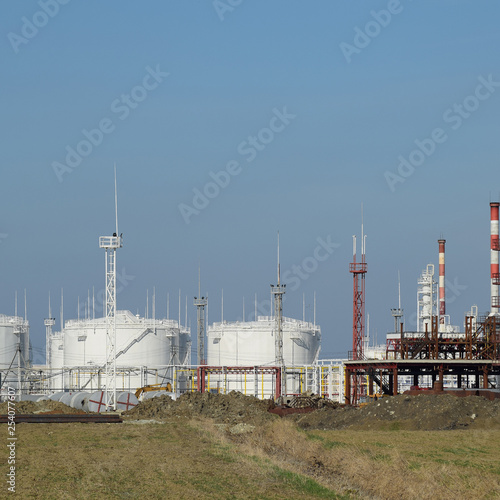 Distillation columns, pipes and other equipment furnaces refinery. photo