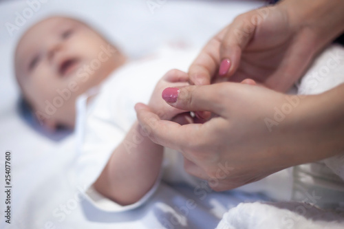 mother and newborn baby hands