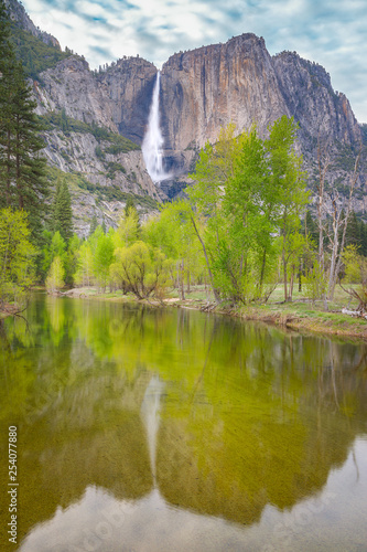Yosemite waterfalls reflected in Merced river, Yosemite National Park, California, USA