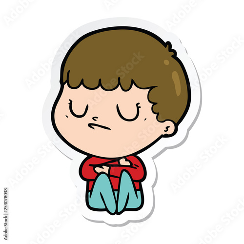 sticker of a cartoon grumpy boy