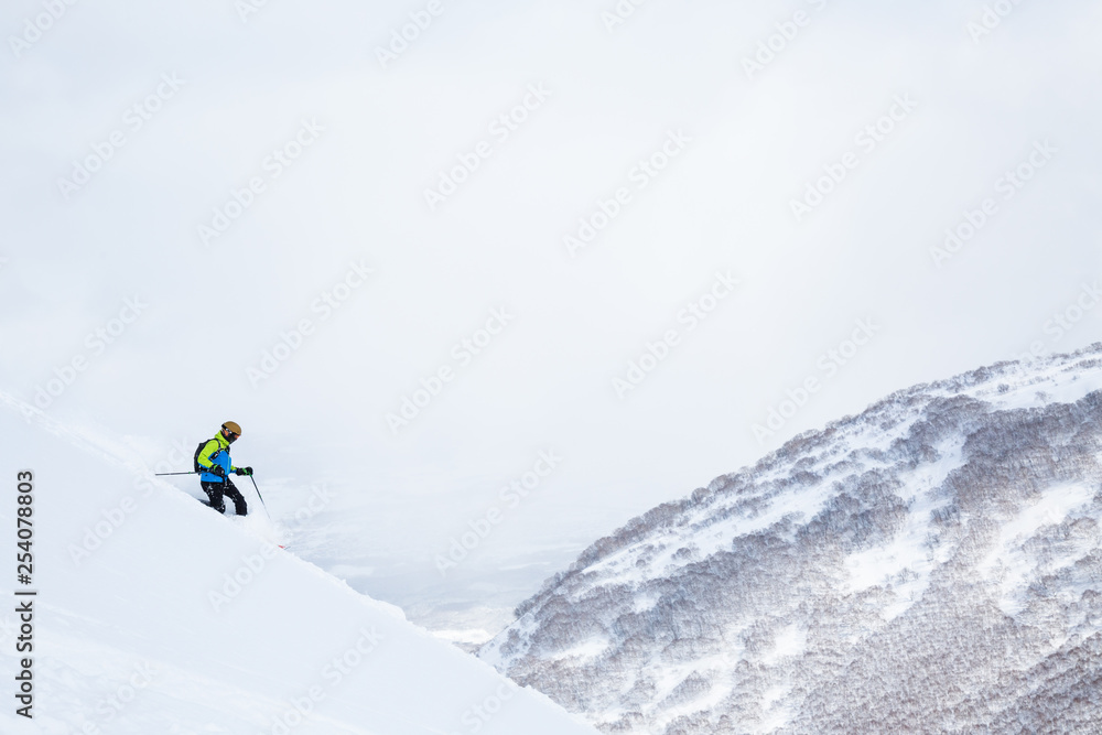 Telemark skier in the backcountry of Niseko Japan.