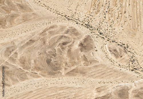 Desert , ISRAEL -February 28, 2019: Flying over dry Desert and Mines of Israel.