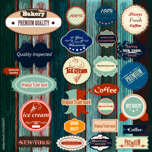 Collection of vector labels in retro style on grunge wooden background