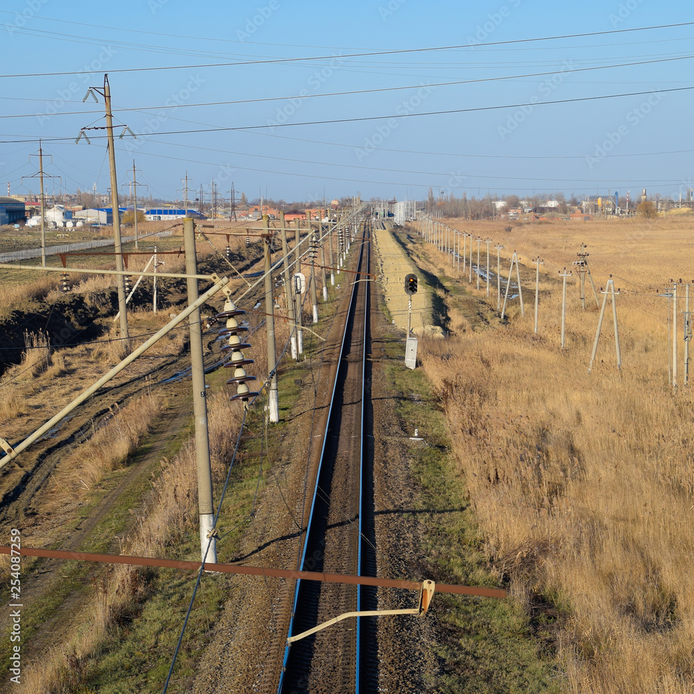 Plot railway. Top view on the rails. High-voltage power lines for electric trains