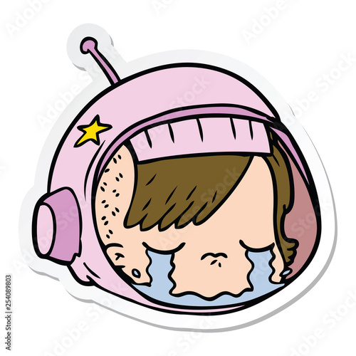 sticker of a cartoon astronaut face crying