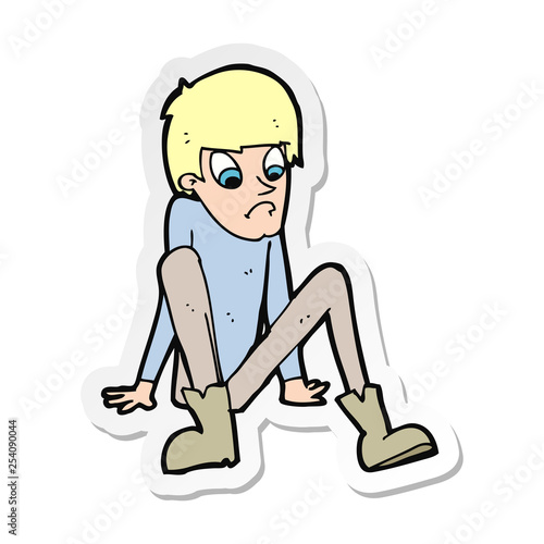 sticker of a cartoon boy sitting on floor