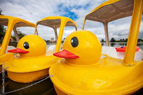 Yellow duck Pedal boat  in park.