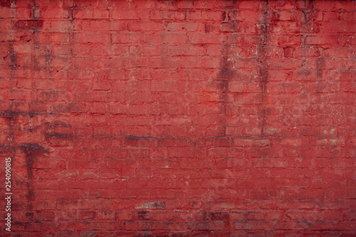 Old textured brick wall with natural defects. Scratches, cracks, crevices, chips, dust, roughness. Can be used as background for design or poster.