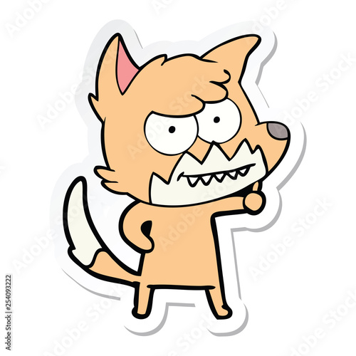 sticker of a cartoon grinning fox