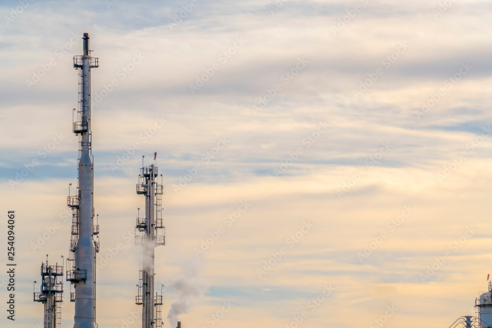 Power Plant emitting smoke against cloudy sky Power Plant emitting smoke against cloudy sky