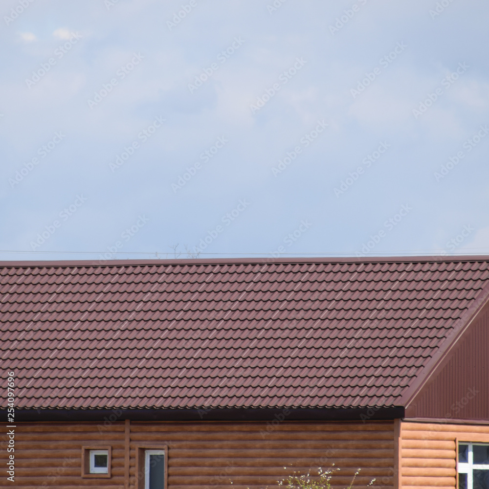 The roof of corrugated sheet on the houses The roof of corrugated sheet on the houses
