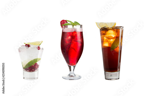 A variety of alcoholic drinks, beverages and cocktails on a white background. Three refreshing different drinks with original decoration.