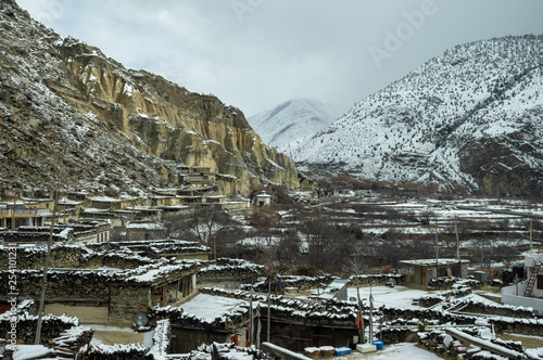 Snow Covered Village in Nepal photo