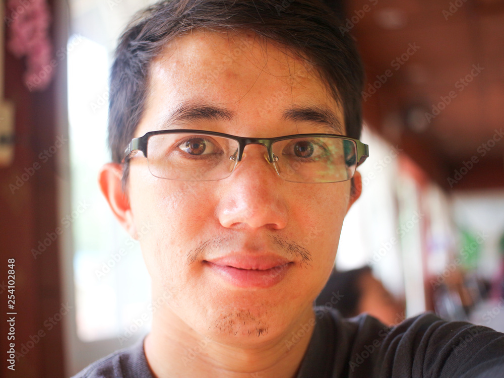 Obraz premium Close up handsome Asian man face