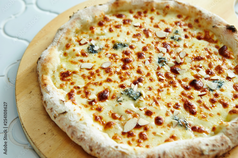Cheese pizza with almond slice Cheese pizza with almond slice